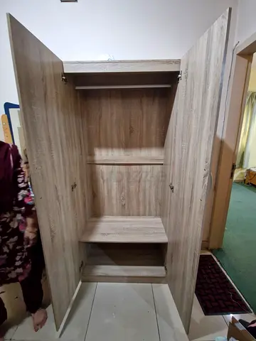 Stylish Wooden Wardrobe with Ample Storage Space