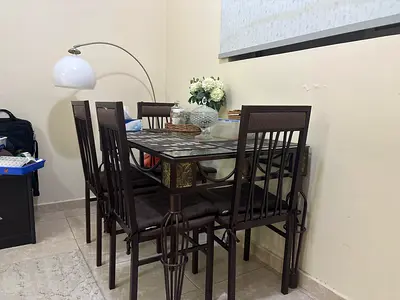 Vintage Glass Top Dining Table with four Chairs (negotiable)