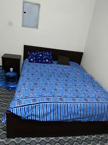 Comfortable Queen Size Bed with Nightstand