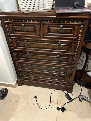 Elegant Wooden Dresser with Vintage Appeal