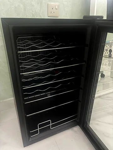 Sleek Black Wine Cooler for Perfect Temperature Control