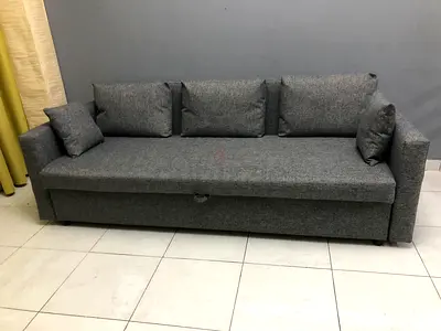 IKEA Friheten three seater sofa bed under storage