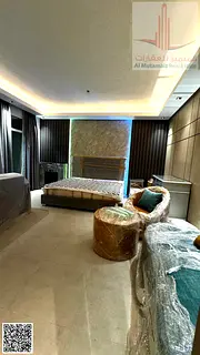 For sale in Ajman: a luxurious, fully furnished studio apartment with décor in Horizon Towers, feat