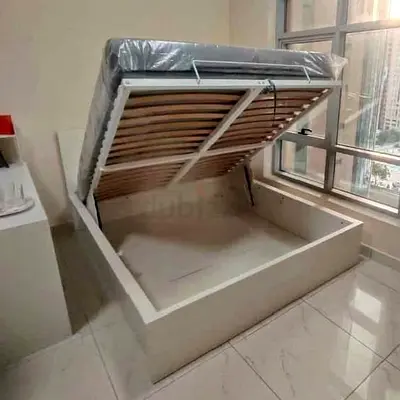 Ikea hydraulic queen size bed frame with storage inside full bed and with Ikea pocket sprung  mattre
