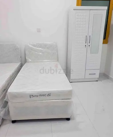 Brand new Single size American style Diwan base bed with mattress and two door Cabinet Available
