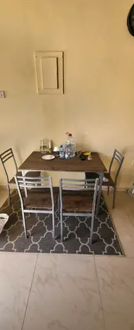Simple Wooden Dining Set with Four Metal Wood Chairs