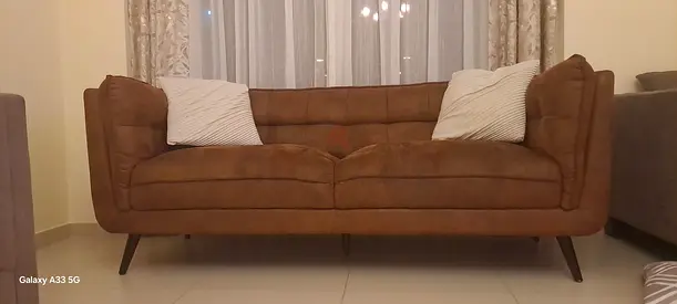 Elegant Brown Sofa for Cozy Living Spaces