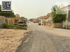 Residential land for sale in Ajman, Al Muwaihat 1 area. Prime location, close to all services.