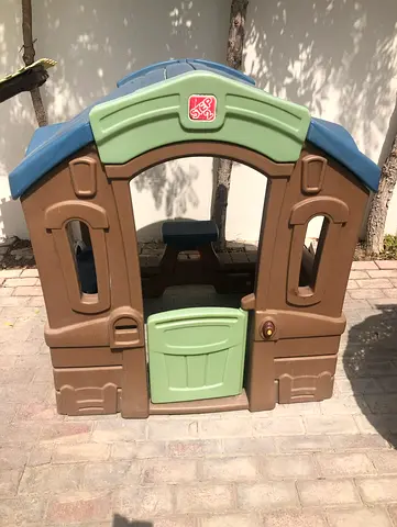 Charming Outdoor Playhouse for Kids