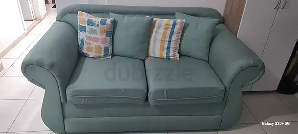 Comfortable  Green Sofa with Cushions