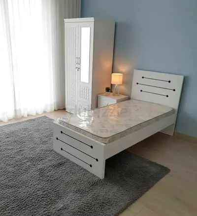 Brand new Single size bed frame With Mattress And two. Door Cabinet Available