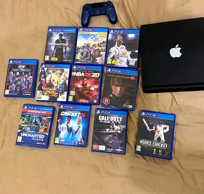 Playstation 4 + Controller + 11 games for sale
