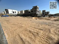 Your Golden Opportunity in Al Aamerah: A Residential–Commercial Plot on a Paved Road with a Rare S