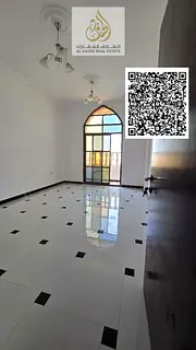 A one-bedroom apartment with a living room, two bathrooms, and a balcony. It's a second-to-last-
