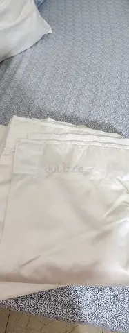 Offwhite silk high quality curtain pair 50dhs