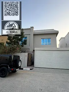 For rent in Al Zameela, Ajman: a villa with 5 master bedrooms, a majlis, a living room, a kitchen, a