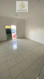 Annual rent in Ajman, Al Rashidiya 3 area, opposite Ajman Towers One, near the Corniche. The buildin