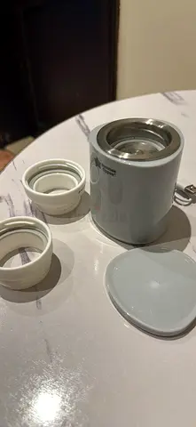 Tomme tippe milk heater