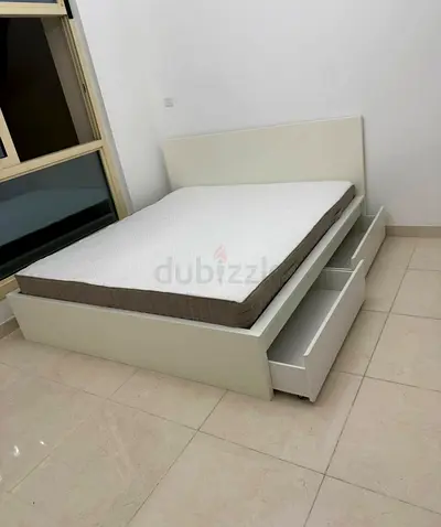 IKEA malam king‑size bed (180 × 200 cm) with 2 storage drawers underneath and an IKEA mattress