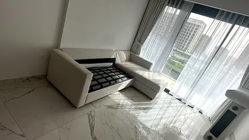 Beige L shape sofa bed with mattress