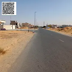 For sale: Residential investment land for villas in Ajman, Al Bahia area (fees included). The land i
