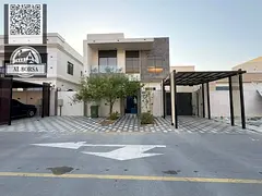 For sale in Al-Haliyo 2, a two-story villa with a roof, 4 master bedrooms, a living room, a majlis,