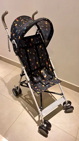 Compact and Cozy Stroller with Fun Design