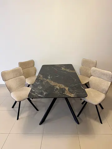 Sleek Dining Table with Plush Chairs