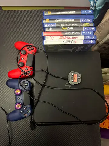 PS4 Slim Bundle – 2 Controllers + Games + gaming chair + gaming headset | Excellent Condition