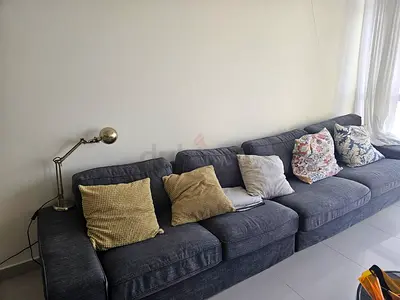 Comfortable L-Shaped Sofa with Cozy Pillows