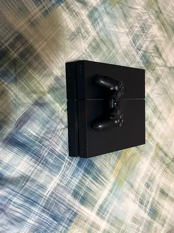 PlayStation 4 for sale with 1 controller