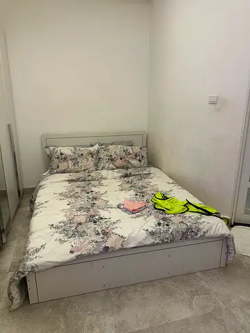 Comfortable Queen Bed with Stylish Bedding