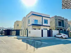 Corner villa at an affordable price, including air conditioning, in one of Ajman's most prestigi