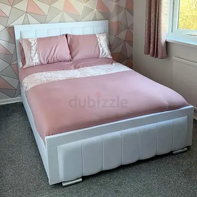 Elegant White Bed Frame with Comfortable Bedding