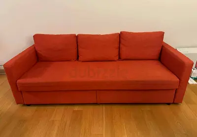 Cozy Orange Sofa - Excellent Condition