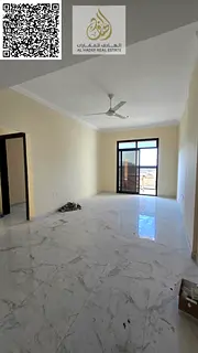 Two-bedroom apartment with a living room for annual rent, first occupancy, with beautiful finishes.