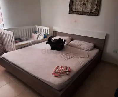 Comfortable king size bed with 2 side table a dressing table with mirror and 1 computer table