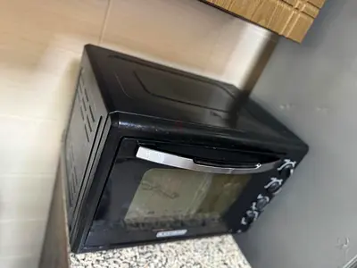 Compact Black Microwave Oven for Sale