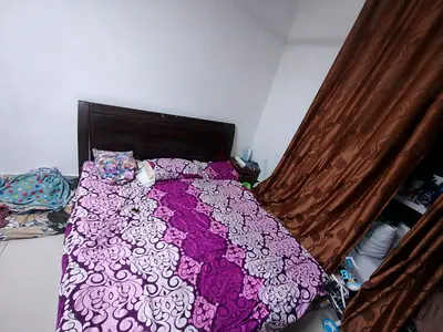 Comfortable King Size Bed with Stylish Headboard