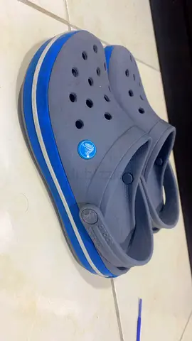 Comfortable Grey Crocs with Blue Accents