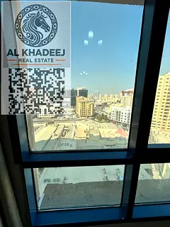 Two-bedroom apartment for sale in Al-Naeema Tower C With an open view overlooking Al-Hikma School an