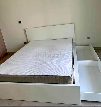 ikea malam king size bed with 2 storage drawers underneath and with ikea mattress