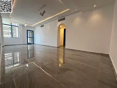 Luxurious two-bedroom apartment with a living room, featuring high-end finishes, a spacious living r