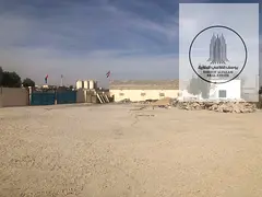 Special Offer for Rent ​​Spacious Yard in a Strategic Location in Al Sajaa Industrial Area with 