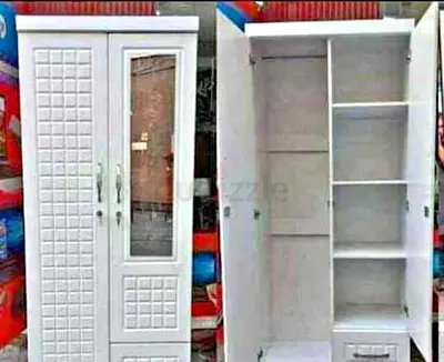 Stylish White Wardrobe with Shelves and Drawer