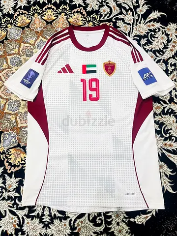 تيشيرتات الوحدة والشارقة أصلية + جاكيتات منتخب الإمارات