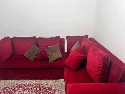 Elegant Red Velvet L-Shaped Sofa with Plush Cushions