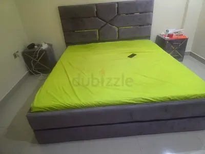 Contemporary Green Bed with Stylish Nightstands