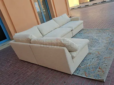 Looks great Condition Home Center Swin Sofa Beige