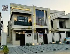 Luxury villa for sale in Al Helio, Ajman. Registration fees and air conditioning included. Freehold